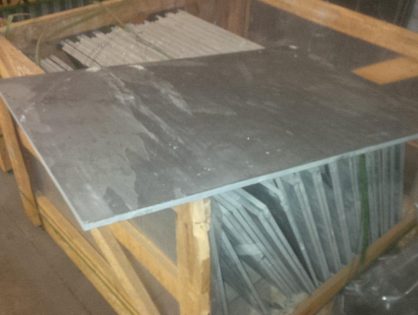 Hand selecting slate for a valued custom...